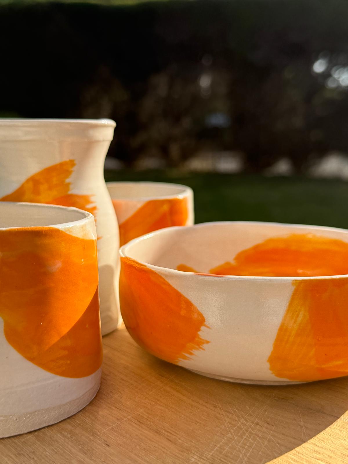 A handmade speckled white mug